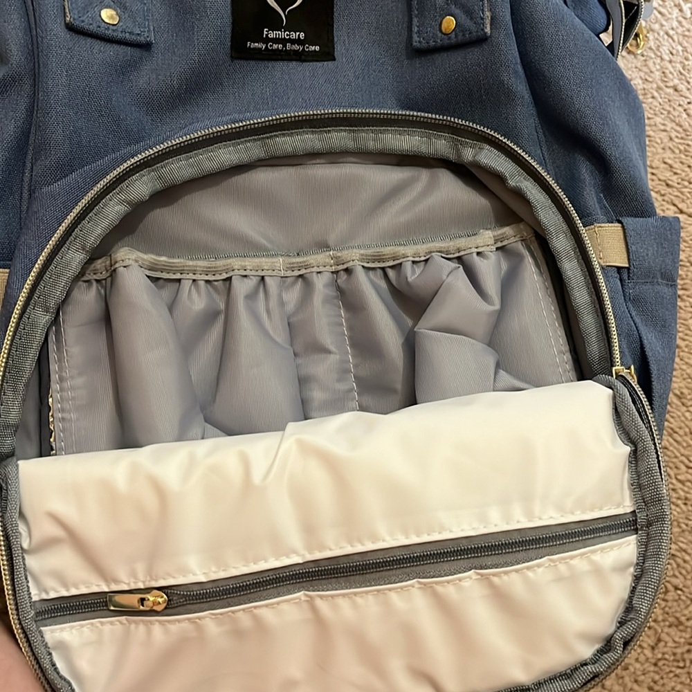 Brand new famicare baby bag never used, Demi blue gold zippers, very cute!